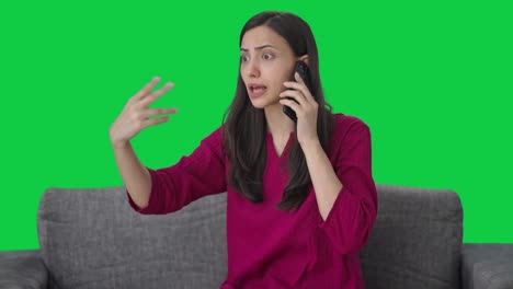 Angry-Indian-woman-shouting-on-someone-on-call-Green-screen