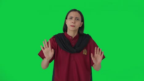 Angry-Indian-female-hotel-staff-shouting-on-guests-Green-screen