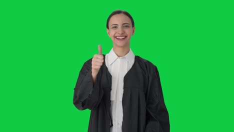 Happy-Indian-female-lawyer-showing-thumbs-up-Green-screen