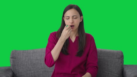 Indian-woman-checking-fever-using-thermometer-Green-screen