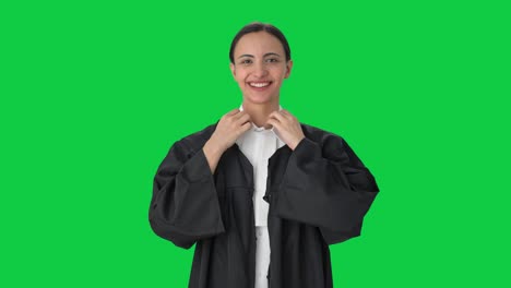 Happy-Indian-female-lawyer-getting-ready-Green-screen