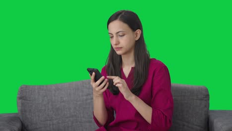 Indian-woman-using-a-phone-Green-screen