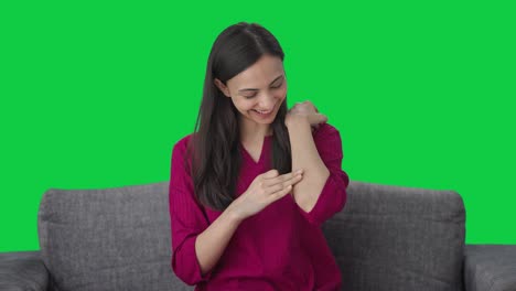 Happy-Indian-woman-removing-the-bandage-Green-screen
