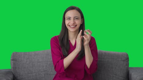 Happy-Indian-woman-waving-clapping-and-appreciating-Green-screen