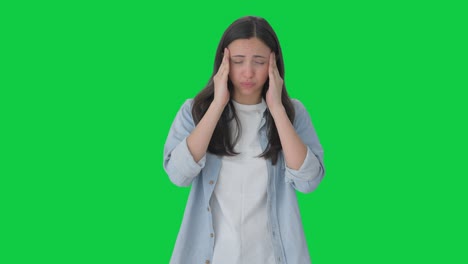 Indisches-Mädchen-Mit-Kopfschmerzen,-Grüner-Bildschirm