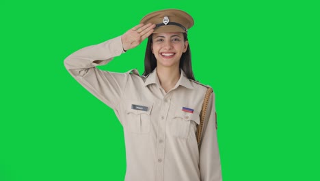 Happy-Indian-female-police-officer-saluting-Green-screen