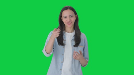 Happy-Indian-girl-talking-to-the-camera-Green-screen