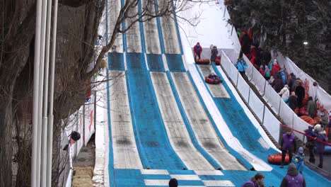 Kiev-Ukraine---January-11,-2021:-mountain-for-descent-on-an-inflatable-ring-on-the-territory-of-the-National-Complex-Expocenter-of-Ukraine-VDNH