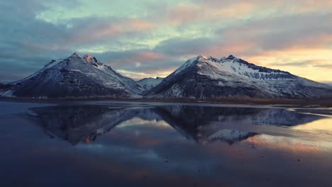Snowy-mountains-against-sundown-sky