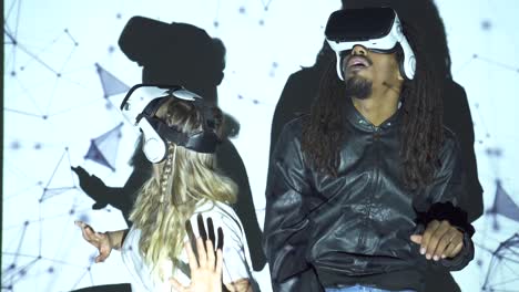 Diverse-friends-interacting-with-virtual-reality
