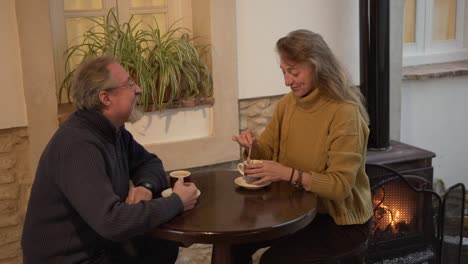 Senior-couple-drinking-coffee-and-talking