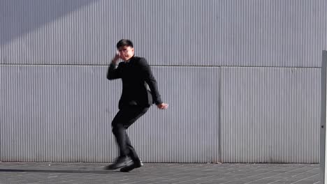 Businessman-performing-breakdance-in-street