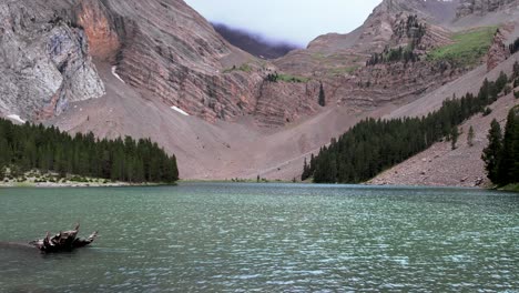 Calm-lake-in-mountainous-terrain