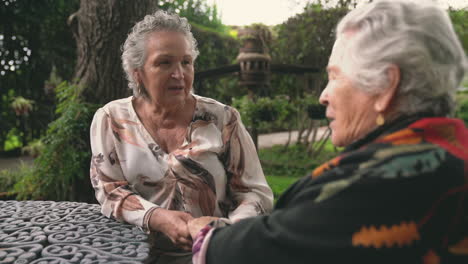 Elderly-women-talking-in-garden