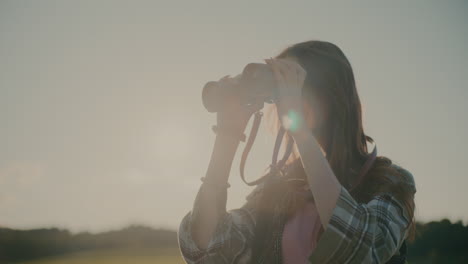 Young-Woman-Exploring-Through-Binocular