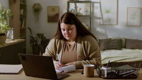 Young-woman-working-at-home