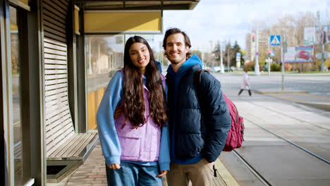 Couple-at-bus-stop