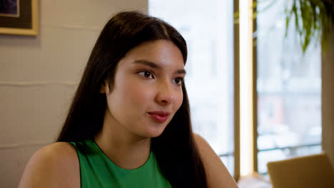 Closeup-of-woman's-face-in-a-restaurant