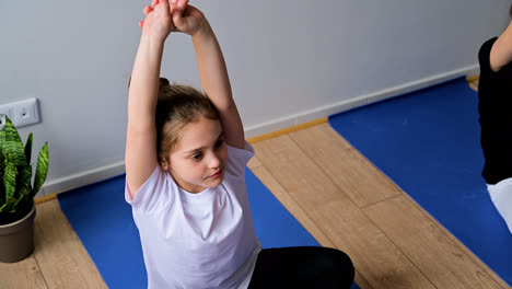 Girls-exercising-in-yoga-class
