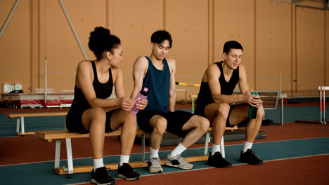 Young-people-relaxing-at-the-fitness-center