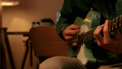Man-playing-guitar