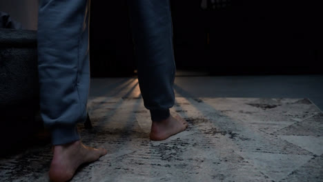 Closeup-of-man's-feet-on-the-floor