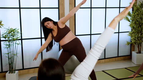 Women-doing-yoga-indoors