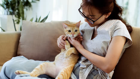 Woman-petting-a-cat