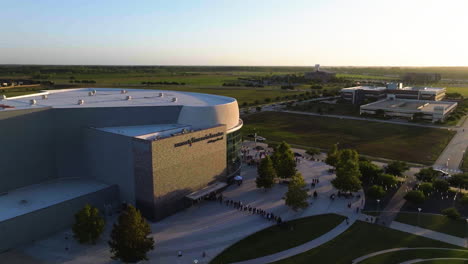 Drone-shot-around-the-sunlit-Smart-Financial-Centre-in-Sugar-Land,-Texas,-USA