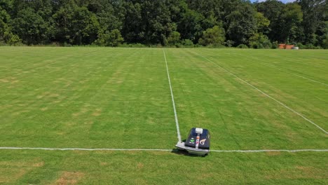 Autonomous-robot-painting-white-lines-on-the-playing-field
