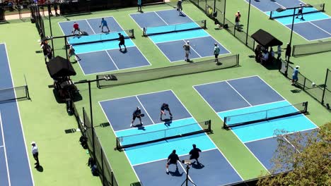Aerial-View-Over-Multiple-Pickleball-Courts-With-Matches-Being-Played