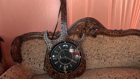 Clock-Scene-The-clock-is-being-fitted-in-the-shape-of-a-guitar-and-is-best-for-decorators