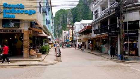 People-and-traffic-on-the-streets-of-El-Nido-in-popular-tourism-destination-of-El-Nido,-Palawan,-Philippines,-Southeast-Asia