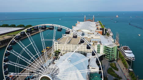 Aerial-view-over-the-Centennial-wheel-at-the-Navy-pier,-sunny-morning-in-Chicago,-USA