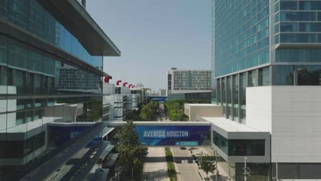 Aerial-drone-view-of-Avenida-Houston-with-George-R-Brown-Convention-Center,-Discovery-Green-and-major-Hotels-in-Texas’-largest-convention-and-entertainment-area-located-in-downtown-Houston-Texas