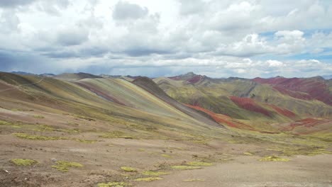 Camera-Pan-Rainbow-Mountains,-Vinicunca,-Winikunka,-Red-Valley-in-Slow-Motion