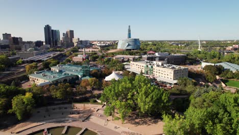 Gorgeous-summer-aerial-of-downtown-Winnipeg,-MB.-4K