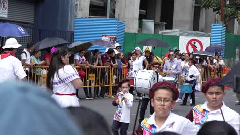 Young-Student-Marching-Band-Walking-Down-Avenue-During-Costa-Rican-Independence-Day-Parade