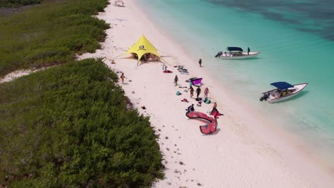 Aerial-orbit-hyper-time-lapse-of-kite-surfing-camp-in-los-roques-beach