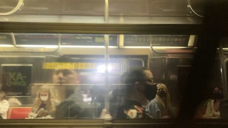 Stunning-shot-of-a-subway-train-passing-underground-in-Manhattan-area-of-New-York-City
