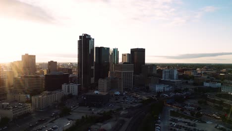 A-Pink-Skyscraper-Sunset-Golden-Hour-Aerial-View-of-the-Urban-Park-Canadian-Museum-for-Human-Rights-The-Forks-Market-Downtown-Winnipeg-Shaw-Park-Provencher-Bridge-Red-River-in-Manitoba-Canada