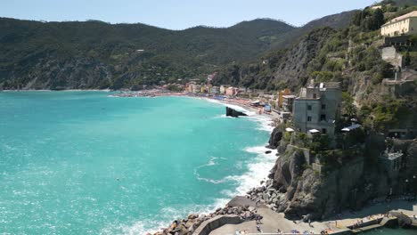 Beautiful-Aerial-View-of-Rock-of-Monterosso-Beach-in-Cinque,-Terre,-Italy