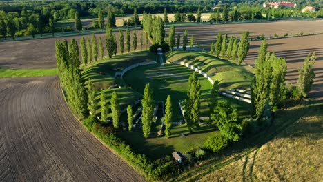 Aerial-View-Of-Amphitheater-Carnuntum-In-Austria-At-Sunset---drone-shot