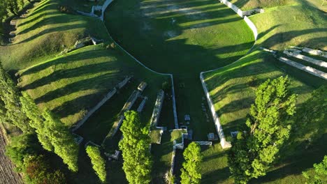Amphitheater-Carnuntum-In-Austria---aerial-drone-shot