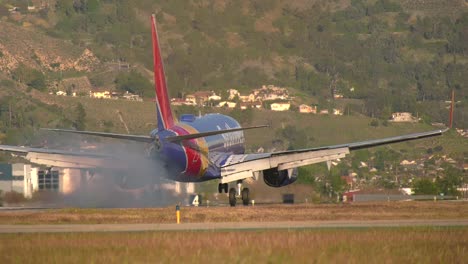 Airplane-touches-down-in-runway