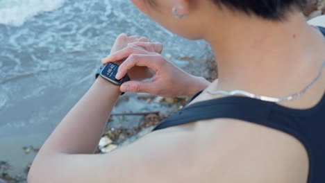 Close-up-of-a-sporty-girl's-wrist-with-heart-rate-watch