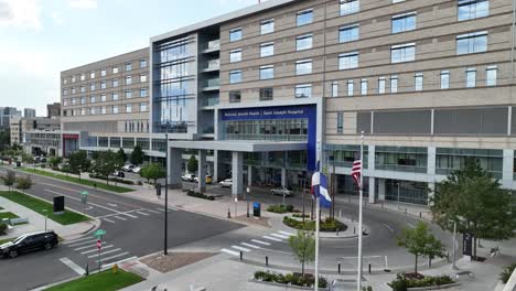 Frontal-drone-view-of-National-Jewish-Health-Saint-Joseph-Hospital,-Denver