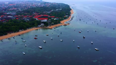 Mooring-Boats-At-The-Beachfront-Town-And-Resort-In-Sanur,-Bali-Island,-Indonesia