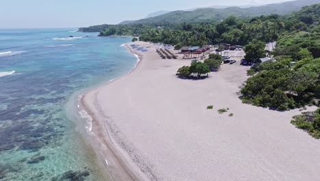 Drone-flying-over-Playa-El-Quemaito-beach,-Barahona-in-Dominican-Republic