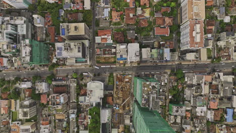 Colombo-Sri-Lanka-Aerial-v25-vertical-top-down-view,-flyover-Bambalapitiya-and-Kollupitiya-capturing-skyscraper-in-construction,-upscale-residential-neighborhoods---Shot-with-Mavic-3-Cine---April-2023
